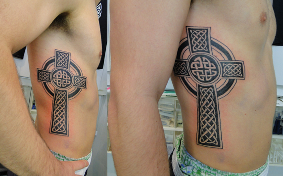 Large Celtic Cross on Rib Cage Tattoo