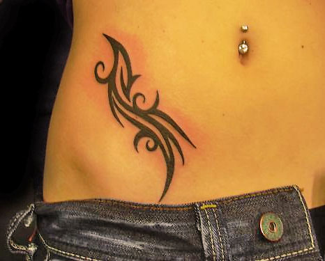 Tribal hip tattoo