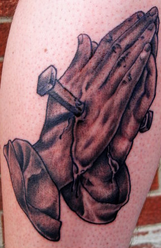 tattoos of jesus hands. Praying hands Tattoo. Warning