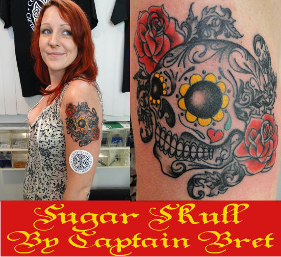 A custom Sugar Skull with Roses Tattoo By Captain Bret