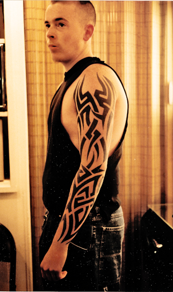 Tribal Full Arm Tattoo